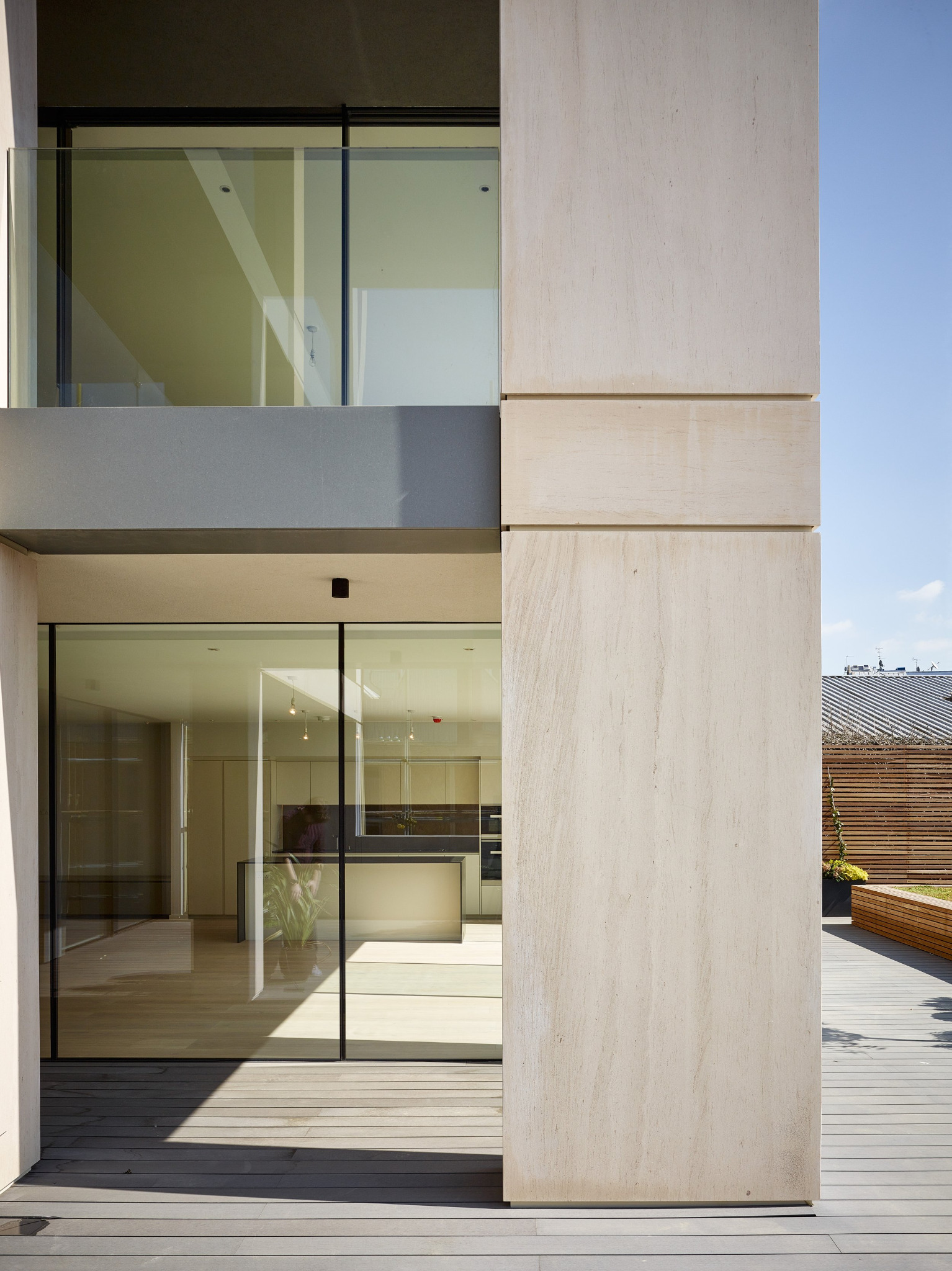 CAL_arch architectural project exterior detail with pale brick, stone, glazing and timber